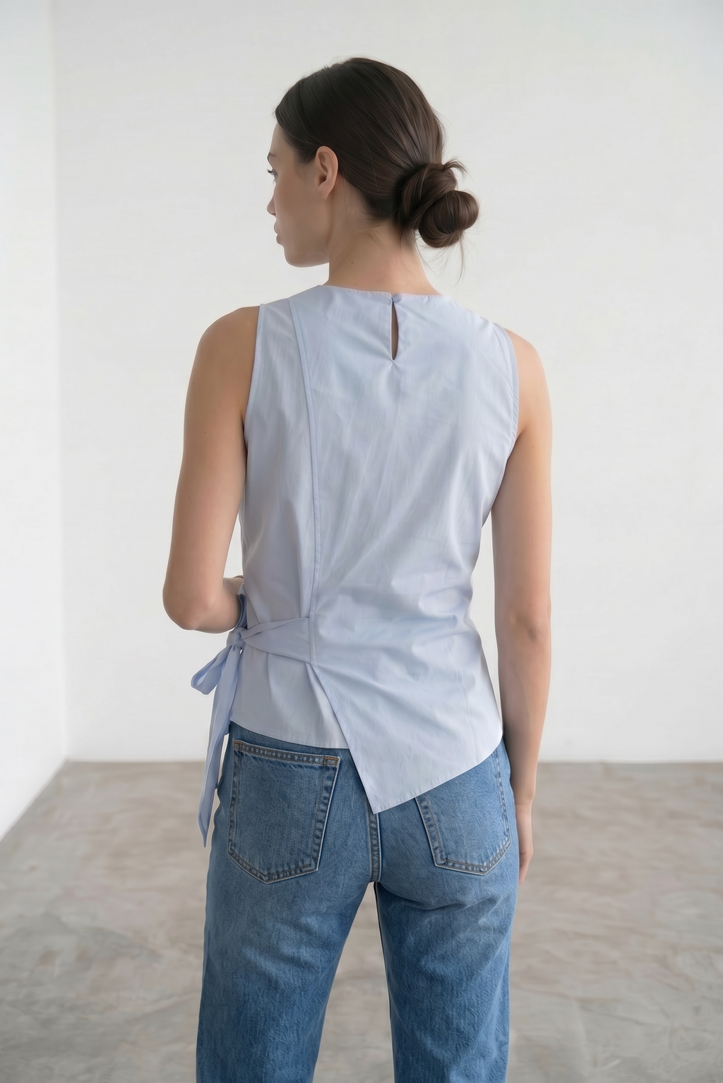 Sleeveless Surplice Top With A Side Bow - Ice Blue