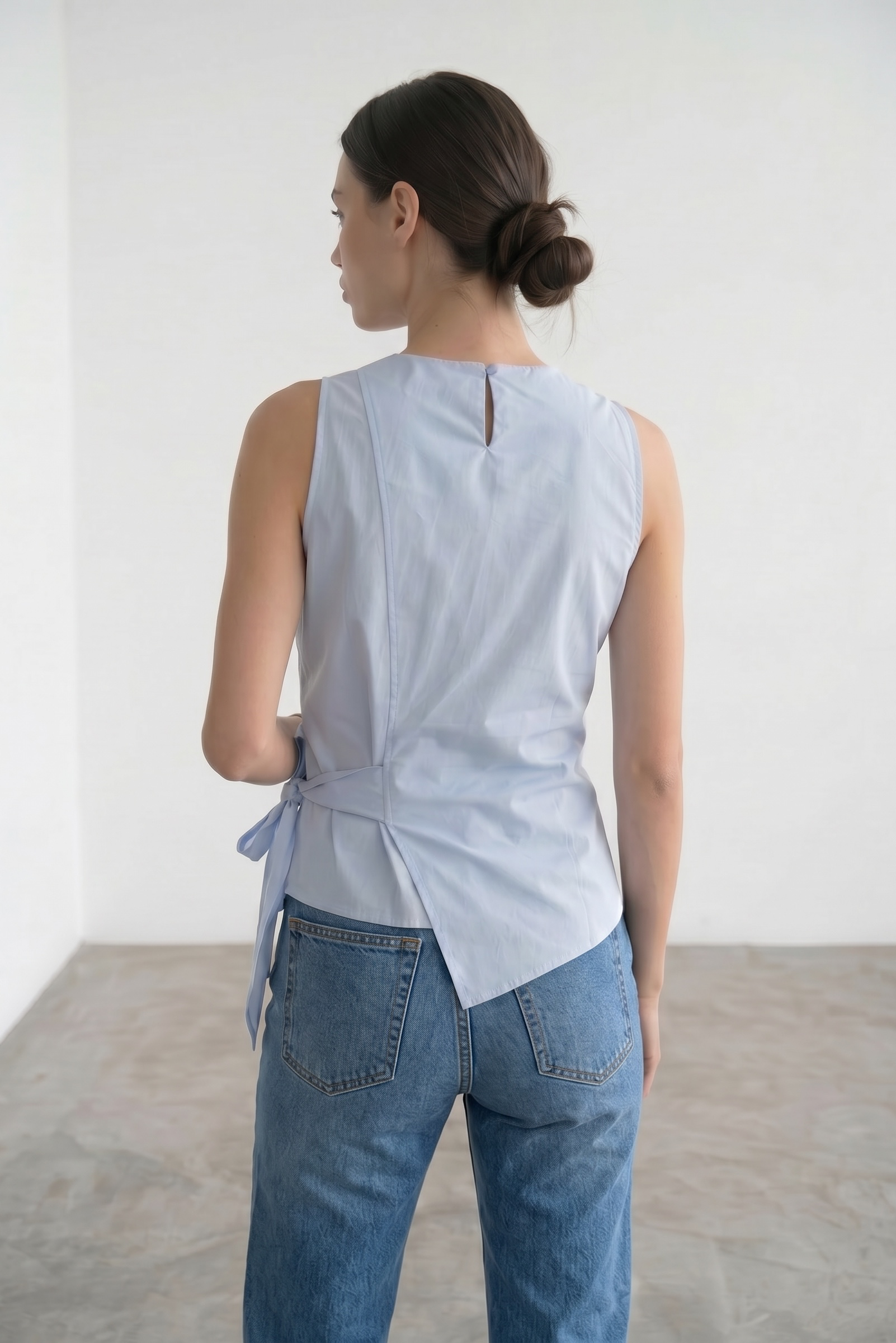 Sleeveless Surplice Top With A Side Bow - Ice Blue